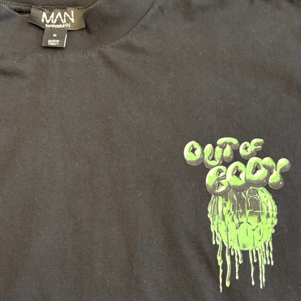 MAN Black Tee with Green Graphic